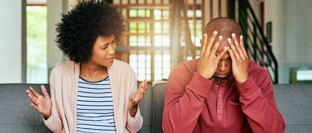 Young couple arguing with guy holding his head Young couple arguing with guy holding his head
