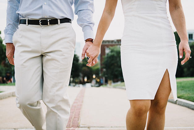 Compliments Men Can't Resist-Well-dressed couple walking hand-in-hand Compliments Men Can't Resist-Well-dressed couple walking hand-in-hand
