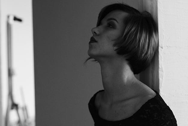 Get Your Ex Back by Asking These Question-Lady lost in thoughts leaning against the wall Get Your Ex Back by Asking These Question-Lady lost in thoughts leaning against the wall