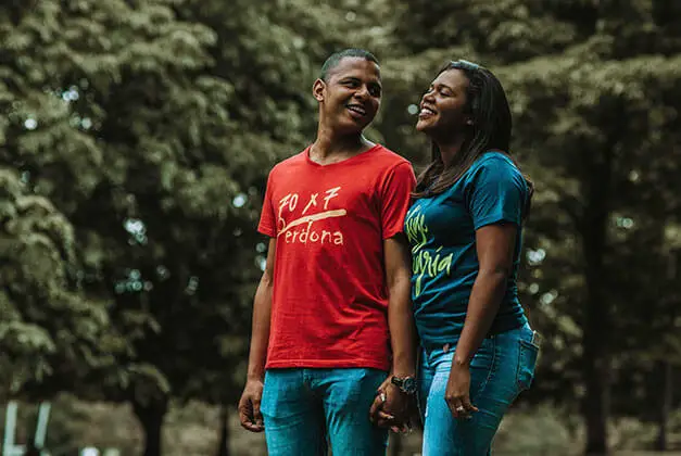 How to Compliment a Guy-Young African-American Couple Smiling in the Park How to Compliment a Guy-Young African-American Couple Smiling in the Park