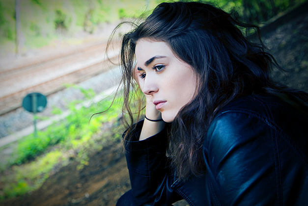 Questions to Ask Yourself Before Getting Ex Back-Young lady in thoughts looking away from train tracks Questions to Ask Yourself Before Getting Ex Back-Young lady in thoughts looking away from train tracks