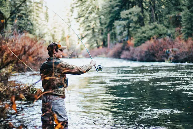 How To Make A Man Feel Needed And respected - Man fishing alone in a lake