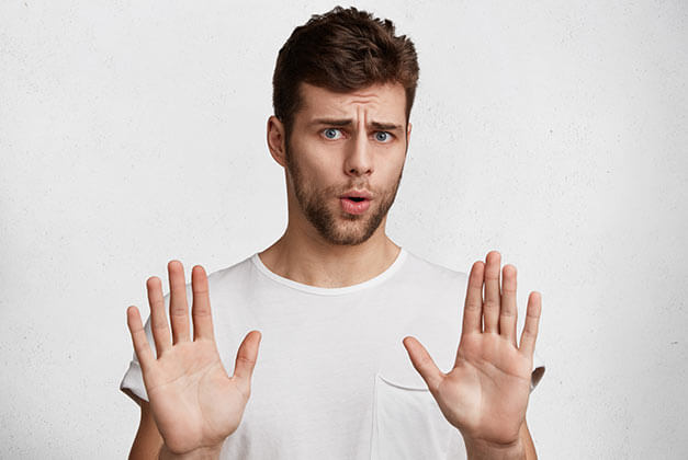 Why Do Men Pull Away - Man with refusal gesture saying leave me in peace Why Do Men Pull Away - Man with refusal gesture saying leave me in peace