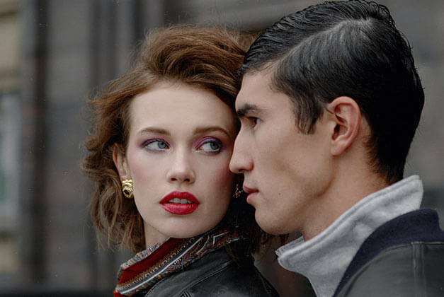 Why Men Pull Away - Man looking forward while girlfriend is looking at him Why Men Pull Away - Man looking forward while girlfriend is looking at him