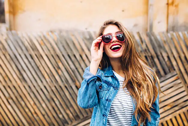 I Love Him But He Doesn't Love Me-Beautiful young smiling lady in outdoors with sunglasses on