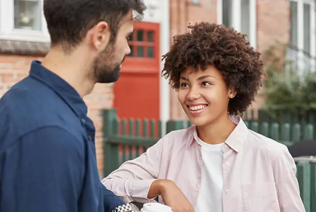 How to Communicate Your Needs to a Man - Happy mixed - race couple enjoying a conversation outdoors How to Communicate Your Needs to a Man - Happy mixed-race couple enjoying a conversation outdoors