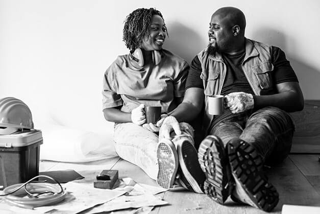 Ways to Communicate Better With Men - African - American couple chatting while sitting on the floor of new apartment Ways to Communicate Better With Men - African - American couple chatting while sitting on the floor of new apartment