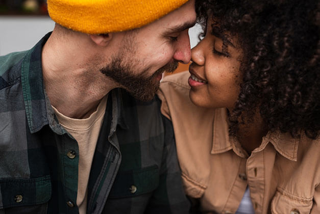 Ways to Communicate in a Relationship With a Man - Beautiful young couple trying a kiss Ways to Communicate in a Relationship With a Man - Beautiful young couple trying a kiss